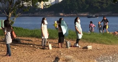 نساء هونج كونج يخسرن الوزن بالنظر للشمس فقط.. "شمسيتك وعالبلكونة عدل"
