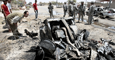 مقتل 9 أشخاص بتفجير استهدف موكب وزير ببغداد