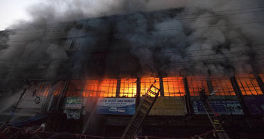 مصرع 4 أشخاص وإصابة 7 آخرين فى حريق مبنى بمدينة كراتشى الباكستانية
