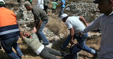 إصابة فلسطينيين خلال قمع الاحتلال مسيرة تندد بتجريف الأرض فى بيت جالا