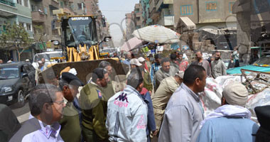 بالصور .. حملة لإزالة التعديات فى مدينة الفيوم