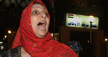 ضابط يعتدى على سيدتين بشارع جامعة الدول