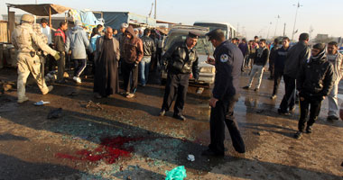 بالصور.. عشرات القتلى والجرحى فى سلسلة انفجارات عنيفة ببغداد