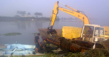 الأجهزة الأمنية بالبحيرة تواصل حملاتها لإزالة الأقفاص السمكية بنهر النيل