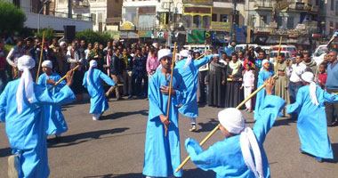 بالصور.. احتفالات بميدان الساعة بقنا فى ذكرى ثورة 25يناير 