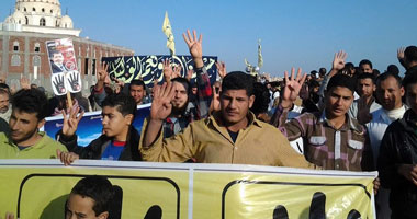 سلسلة ومسيرة إخوانية على رافد الطريق الدولى للإفراج عن المسجونين