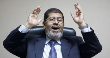 حملة مرسى تعلن فوز مرشحها بالسباق الرئاسى بـ52%