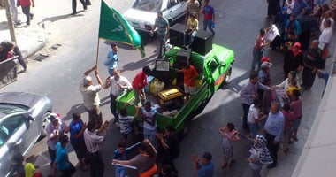 بالصور.. "الوفد" بالإسكندرية يطوف الشوارع بالسيارات لحشد المواطنين للتصويت