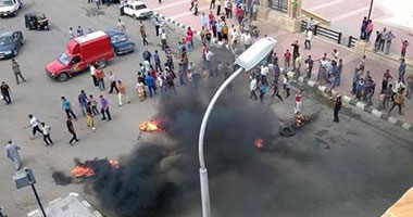 عناصر تنظيم الإخوان يقطعون شارع فيصل بالجيزة