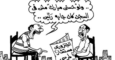 قرارات مرسى بعيون الكاريكاتير