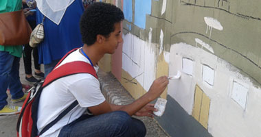 بالصور فريق "المصممين" ينادى: أخرج عجلتك القديمة وساعدنا فى رسم جدران الشوارع