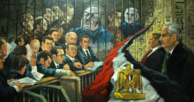 الفنان "طه قرنى" ينتهى من لوحة المحاكمة ضمن جدارية الثورة