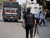 انتشار عناصر الأمن المركزى على أبواب جامعة القاهرة من الخارج لتأمينها