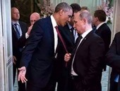 بوتين يجذب أوباما من رابطة عنقه فى صورة مفبركة على فيس بوك