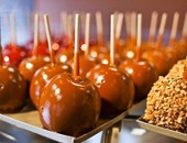 دراسة تحذر من خد الجميل: "التفاح بالكراميل" يسبب التسمم الغذائى