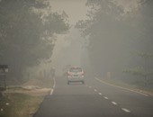 بالصور.. الضباب الناجم عن حرائق الغابات فى سومطرة يصل جاكرتا