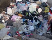 "صحافة المواطن".. شكوى من تراكم القمامة بسلالم الدائرى بمنطقة "إمبابة"