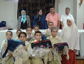 بالصور.. تسليم حقائب وزى مدرسى لطالبات فقيرات من 10 قرى ببنى سويف