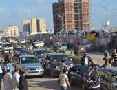 سيارات مرشحين تنقل ناخبين من الهجانة لمدارس الملك فهد بمدينة نصر