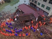 بالصور.. مقتل 16 شخصا وفقدان 21 آخرين فى انهيار أرضى بالصين