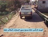 بالصور.. "مرور الجيزة" يغلق كوبرى الدكمى بالبدرشين أمام سيارات النقل