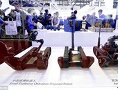 بالصور.. الصين تطور روبوتات تحمل البنادق لمحاربة الإرهاب