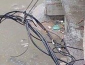صحافة المواطن..أسلاك كهرباء دون غطاء تهدد بتكرار صعق الأمطار فى الإسكندرية