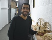 بالصور.. "محمد البيك" يحول الصور الفوتوغرافية إلى لوحات خشبية