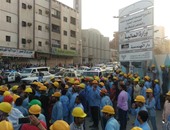 بالصور.. إضراب عمال شركة "بن لادن" السعودية  بسبب تأخر رواتبهم