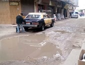 صحافة المواطن ..أحد شوارع المحلة الكبرى يغرق فى مياه الصرف الصحى