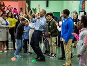 أوباما يشارك طلاب إحدى المدارس بواشنطن الاحتفال بيوم "مارتن لوثر كينج"