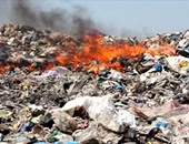 صحافة المواطن:سكان"الترامسة"بقنا يستغيثون من دخان القمامة والمخلفات الطبية