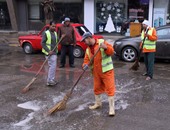 رئيس جهاز 6أكتوبر:فتح بالوعات الصرف ومخرات السيول لشفط مياه الأمطار بالشوارع