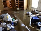 بالصور.. مياه الأمطار تتلف محتويات عدد من المنازل فى ولاية ميزورى بأمريكا