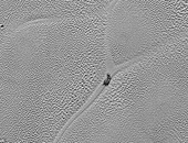 صورة جديدة لناسا تكشف وجود جسم غريب على سطح بلوتو