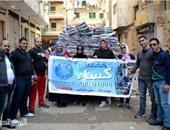بالصور.. "كساء" حملة فريق شباب الخير لتدفئة الإسكندرية