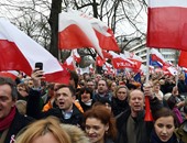 بالصور.. الآلاف يشاركون فى تظاهرة تنادى بالديموقراطية فى بولندا