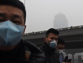 الضباب الدخانى يواصل خنق العاصمة الصينية