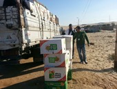 بالصور.. توزيع 2000 كرتونة غذائية و2000 بطانية على أهالى وسط سيناء
