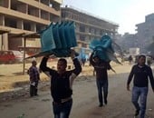 بالصور.. أمن القليوبية يشن حملة إزالة للأكشاك وإشغالات الطرق فى شبرا الخيمة