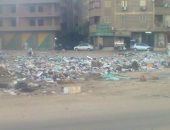 بالصور.. انتشار القمامة بشارع المطار فى إمبابة 