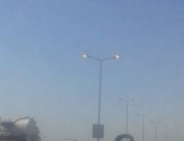 أعمدة كهرباء مضاءة نهارا على محور سعد الدين الشاذلى