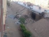 بالصور.. القمامة تغلق نفق الدائرى بمحطة مسجد الرحمن فى الهرم