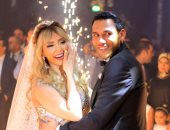 بالصور.. تامر حسنى وصوفينار يشعلان أجواء زفاف محمود وهالة