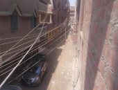 بالصور.. عامود كهربائى يتوسط الشارع فى شبين الكوم والسكان يطالبون بإزالته