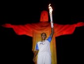 شعلة دورة الألعاب البارالمبية أمام تمثال المسيح بريودى جانيرو