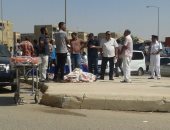 بالصور..مناظرة النيابة لجثة أمين شرطة أكتوبر: رصاصتين أسفل العنق وراء استشهاده