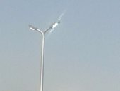 أعمدة كهرباء مضاءة نهارا أمام أرض المعارض فى مدينة نصر