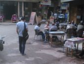 قارئ يشكو من "فرش" المحلات فى شارع أحمد ماهر بفيصل وإعاقتهم للمرور