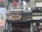 بالصور.. حريق فى محل تجاري بشارع عبد الخالق ثروت 